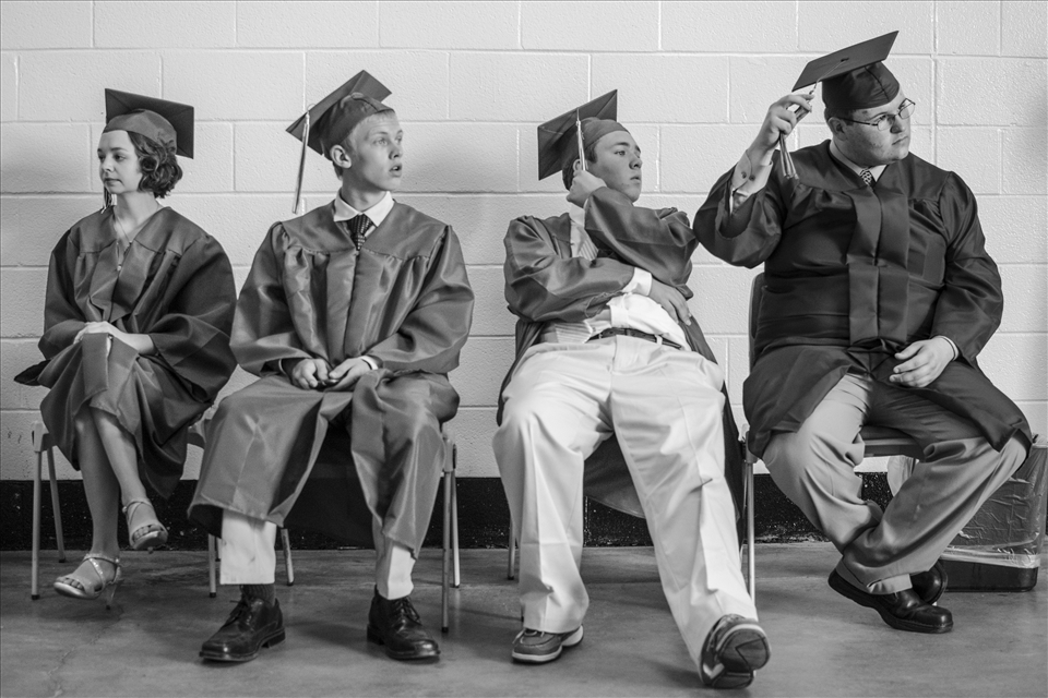 High school students waiting before their commencement.