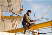 The morning after. A crew member straddles the boom making repairs before we made port in Dublin. If was shortly after sunrise and the mood on board was jubilant as we had claimed second place in the race and survived the big storm.: by defoeand, Views[288]