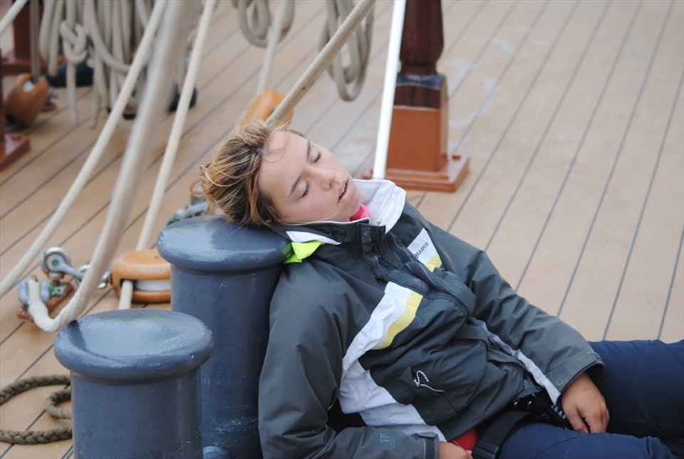 Catching 40 winks. This crew member learned quickly to be an oppurtunistic sleeper. Watches rotated in 4 hour cycles on board, meaning that you worked from (for example) 4-8 o'clock each morning and afternoon. Trying to sleep in the intervening hours, with the ship pitching and rolling, was almost an artform. So every nap counted.