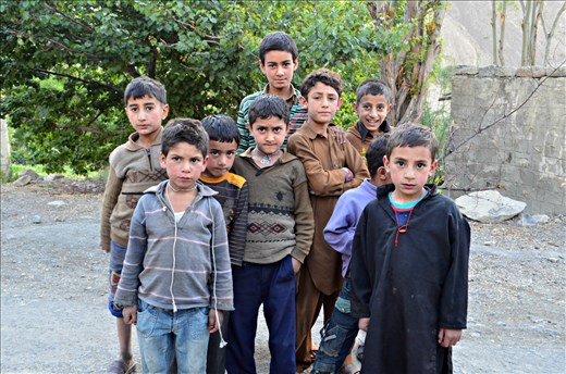 Local children wanted to capture their photo and they seems to be curious.