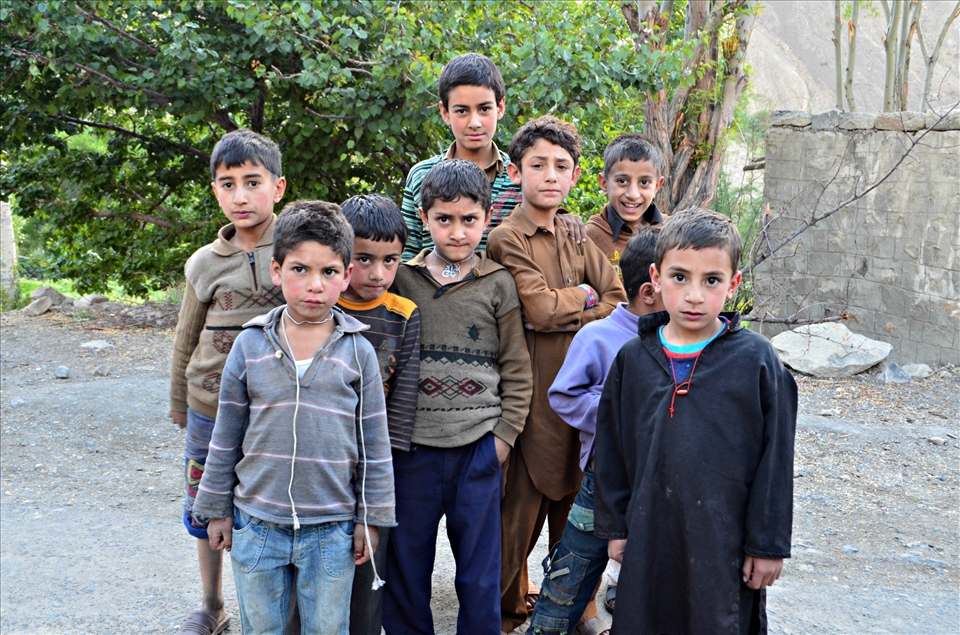 Local children wanted to capture their photo and they seems to be curious.