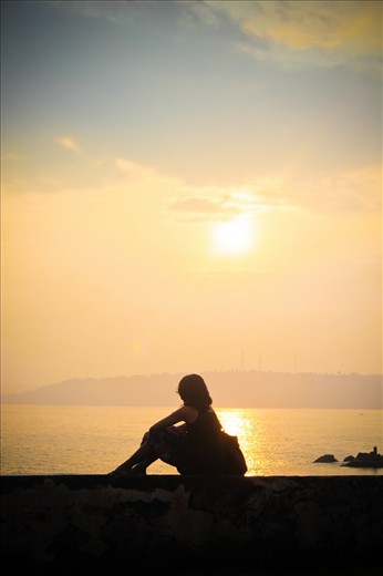 Enjoying the Sunrise at Galle... sitting on the historical galle fort