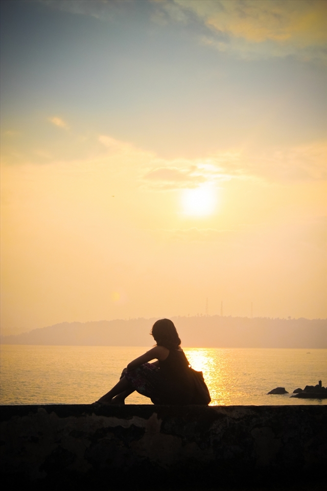 Enjoying the Sunrise at Galle... sitting on the historical galle fort