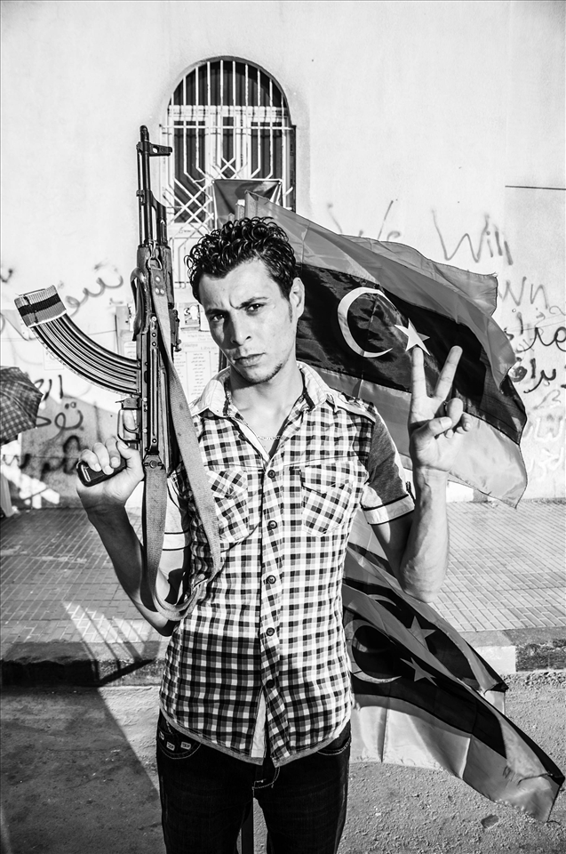 One of the Libyan rebels serving and protecting the local people of Benghazi.