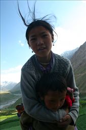 Local children may be hardy and ruddy but retain their immense warmth and curiosity. While the boy seemed a bit circumspect of this stranger, his sister enveloped him in a protective hug and welcomed me with a cheerful, 'Julaay!'.: by descorpio86, Views[413]