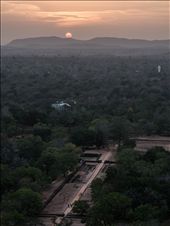 Sunset from the top of Sigiriya rock with Buddha statue far away: by devchandan, Views[638]