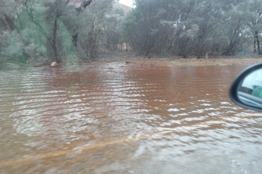 Floods around the bottom of the rock.