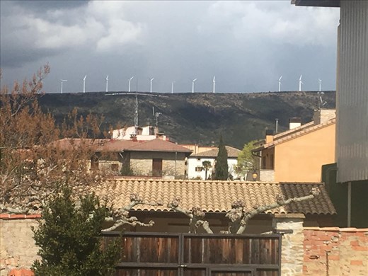 Wind turbines in the distance.