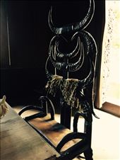 Chair made of black horns, at a table set with crocodile skins and bones. Said to represent worldly desires and mortality. : by dinagosse, Views[466]