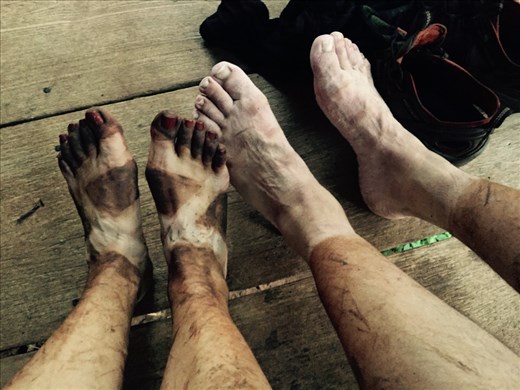 Muddy feet after a day in the caves and muddy trails. 