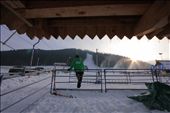 A worker at Nosal Ski Area watches the people while the sun is setting.: by dinowski, Views[455]