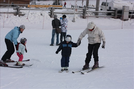 Two mothers teaches her children skiing at Nosal Ski Area.