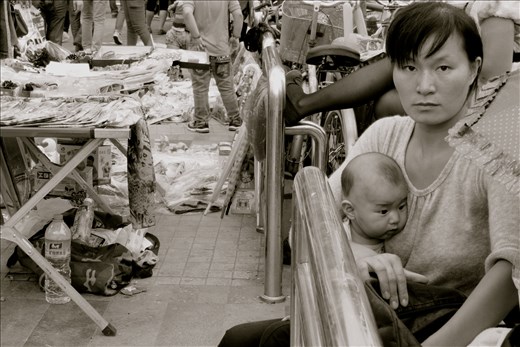 Mother in a Shanghai market. What captured me was her sense of prodness.