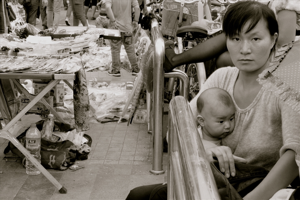Mother in a Shanghai market. What captured me was her sense of prodness.