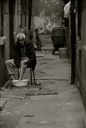 A lonely man at the end of a very long street waiting for his wife to come back.: by discoverychina, Views[411]
