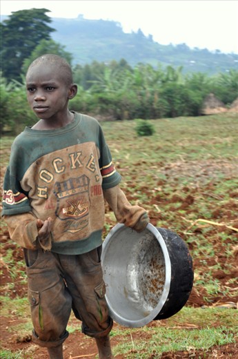 As we continue, we met Christopher, who tells us that he often sits on the side of the mud track that lead to the hotels and waits for tourists to 'give him money or a packet of biscuits'. Sometimes, he collects enough to fill his metal pot, which he then goes and shares with his 2 siblings.