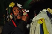 The Bhoti Tribe, in this Trans Himalayan region, believes the spirit of their deceased Guru enters the body of their village priest and solves queries and complaints of the village gathering, on the occasion of Namkan. The Shaman here entranced by faith, stands with sacred scarves around his head and prayer flags offered, jhandis, at his hand, with trident belief. : by divvea, Views[2491]