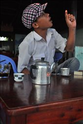 A man sitting in a cafe asks us for foreign cigarettes.: by diwata, Views[717]