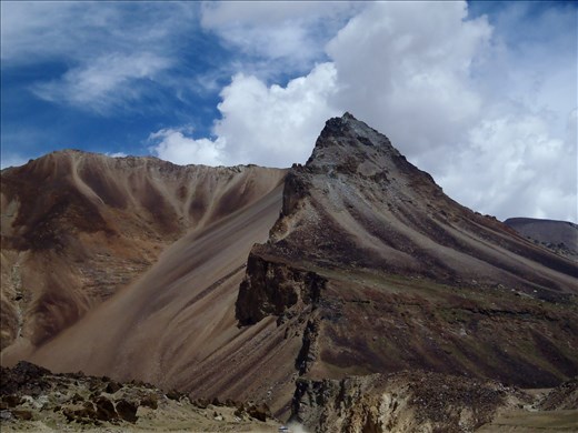 At some point, the landscape changes and you find yourself in a high altitude desert that resembles Mars. And, aside from the occasional bus or truck or fellow motorbike rider, you are left alone to absorb and form an intimate connection with something so powerful.
