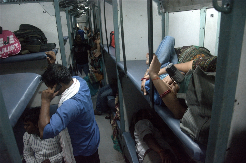 Inside ‘Sleeper Class’, around midnight, somewhere between Rishikesh and Varanasi. The fans were roaring, the car was shaking and you could hear the wheels squealing through the open windows. With two or three people to a bed, the overcrowded car remained loud and busy much of the night. 