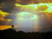 Sunbeams breaking through the clouds, A watch tower keeps an eye on the enemy.: by docbynum, Views[424]