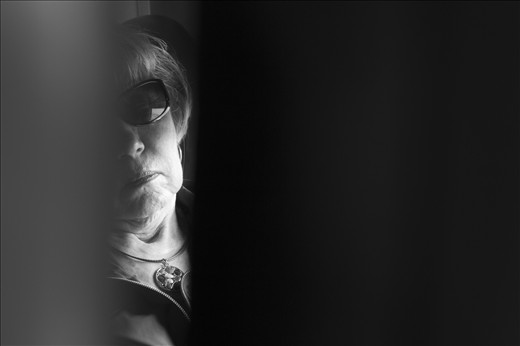 Private moments glimpsed between the seats of economy class add to the surrealism of the longhaul train ride.