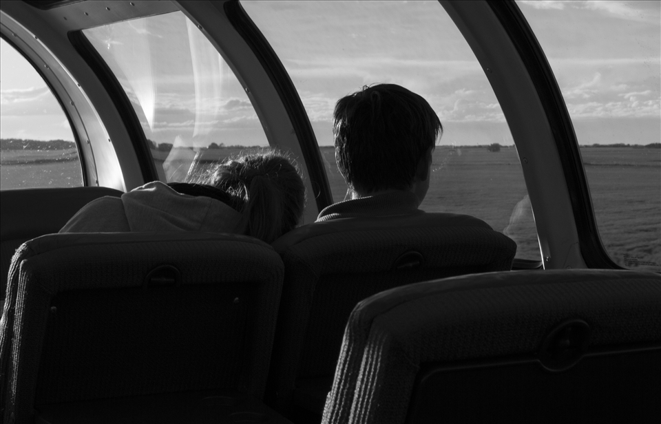 Even against the great Canadian landscape, the eye voyeuristically drifts to fellow passengers.