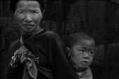 The Akha tribe´s grandparents often care for their grandchildren while parents work in local factories set up by Thailand´s Royal Family to combat a lack of legitimate alternatives to the opium production industry once rife in the area. 

Not one generation before, the Northern tribes had been completely in the grips of the poppy. Old faces bear the scars of this strenous past.: by doitung, Views[821]