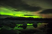 the still water caputres reflections of the aurora.  In the darkness we listen to the glacier break apart in the distance: by dojoman2001, Views[113]