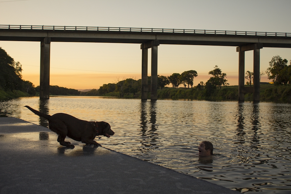 “Look Out Here I Come!” Taking Hazel my 9-month-old Labrador for an afternoon swim in the Pioneer River is always entertaining.  I captured Hazel just as she was about to launch herself on top of my friend.  His look is one of fear as he knows the outcome will be painful.