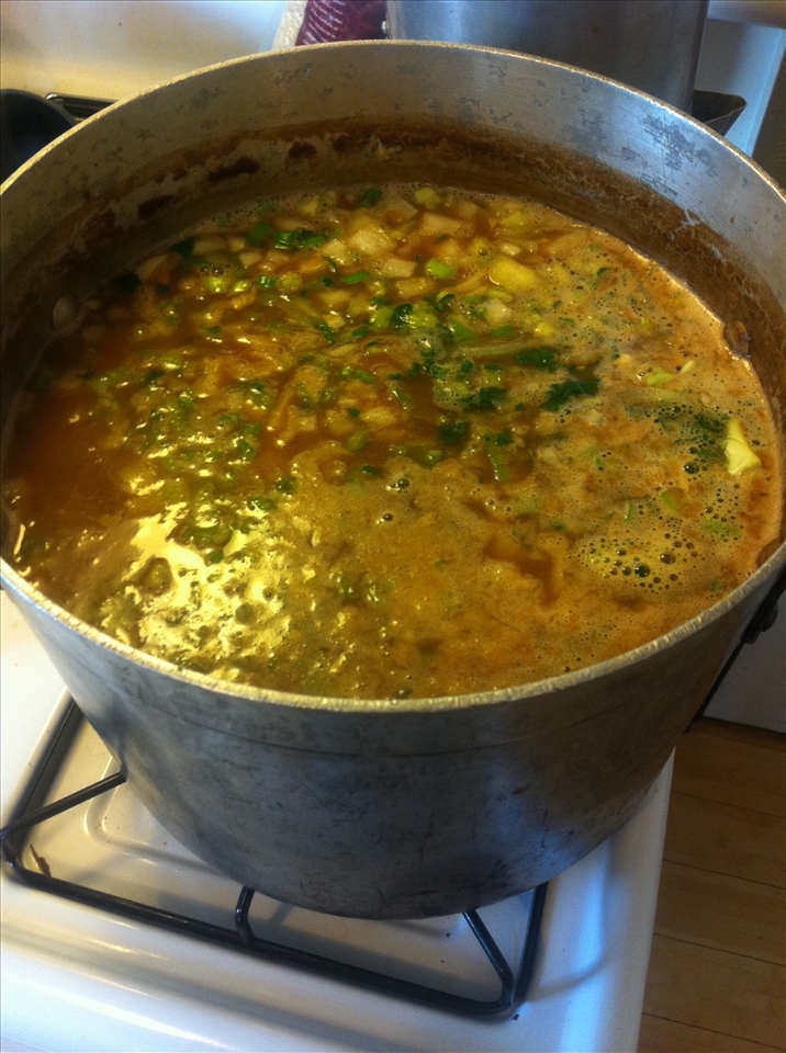 The pot of deliciousness- big and full of flavor- veggies, meat, roux, water