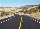After ten days of driving, I reached the destination of my road trip. I took this photo to represent the beginning of my journey to and up the West Coast of the United States. The freshly paved road contrasts the tones of the sky and terrain.  I traveled on many roads, but had to stop for this one.  Shot with my Kodak Easyshare c195.: by dondo, Views[360]