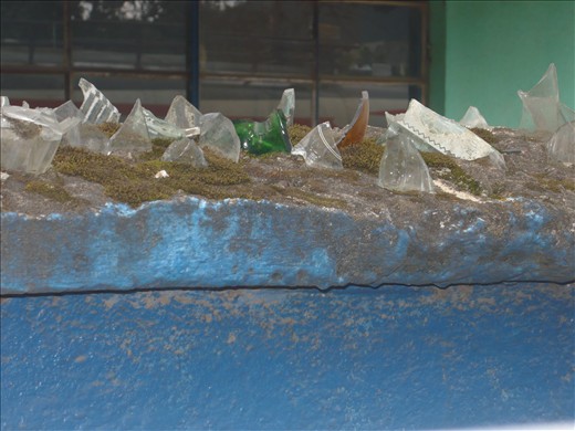 Glass used in place of barbed wire to keep out intruders at a school in San Mateo.