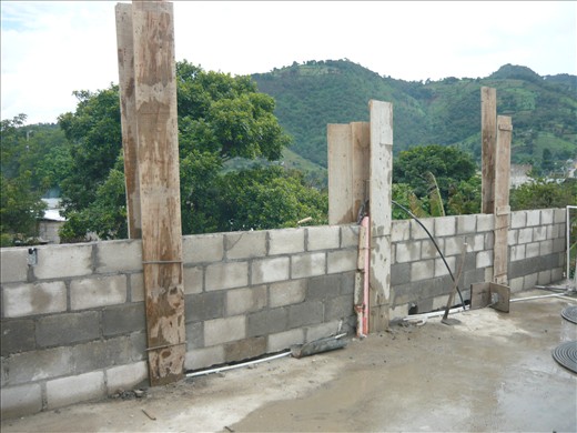 Wooden columns used to make the foundations in the wall.