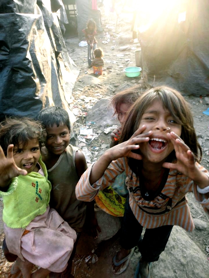 In the slums lie the truely joyful ones...living in the light of the darkness...