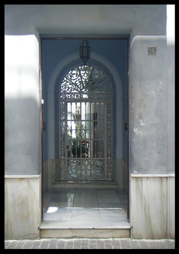 Spells of light on door way and closed in patio