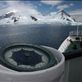 The MV Ushaia's compass points South West as it guides the mighty ship's bow through single and multi-year ice with jagged mountain ranges in the background. Destination - Brown Bluff Strait. by: drewgregory1 Views[624]