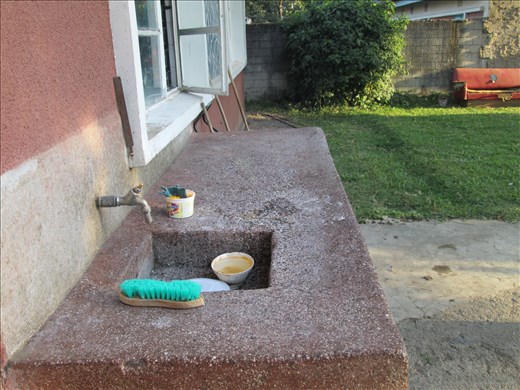 Outside utility for washing clothes and dishes