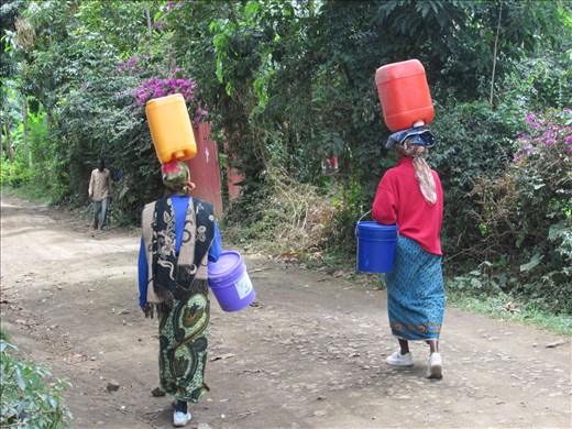 Local women walking past the orphanage
