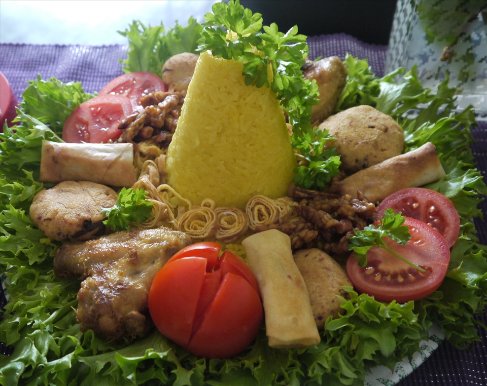 a plate of yellow rice cone