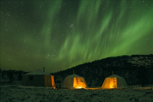 A night out under the aurora borealis, in thick traditional arctic tents.