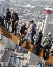 This was the natural photo composition I was looking for, every one's position was different and view points when looking around. This was the perfect focal point to draw you in, my goal was to capture the worker in the yellow overalls in the center of the beam holding his work bag, while kneeling down gripping his feet on the beam. Now it conveys a natural working atmosphere, as if just another day at work not having photos taken. : by dustin, Views[419]