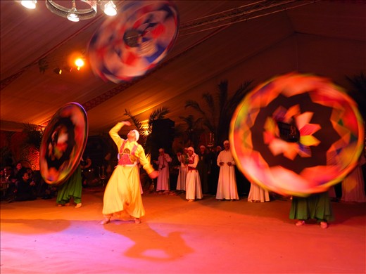 The climax of the Sufi's dance is when they juggle colorful dress.