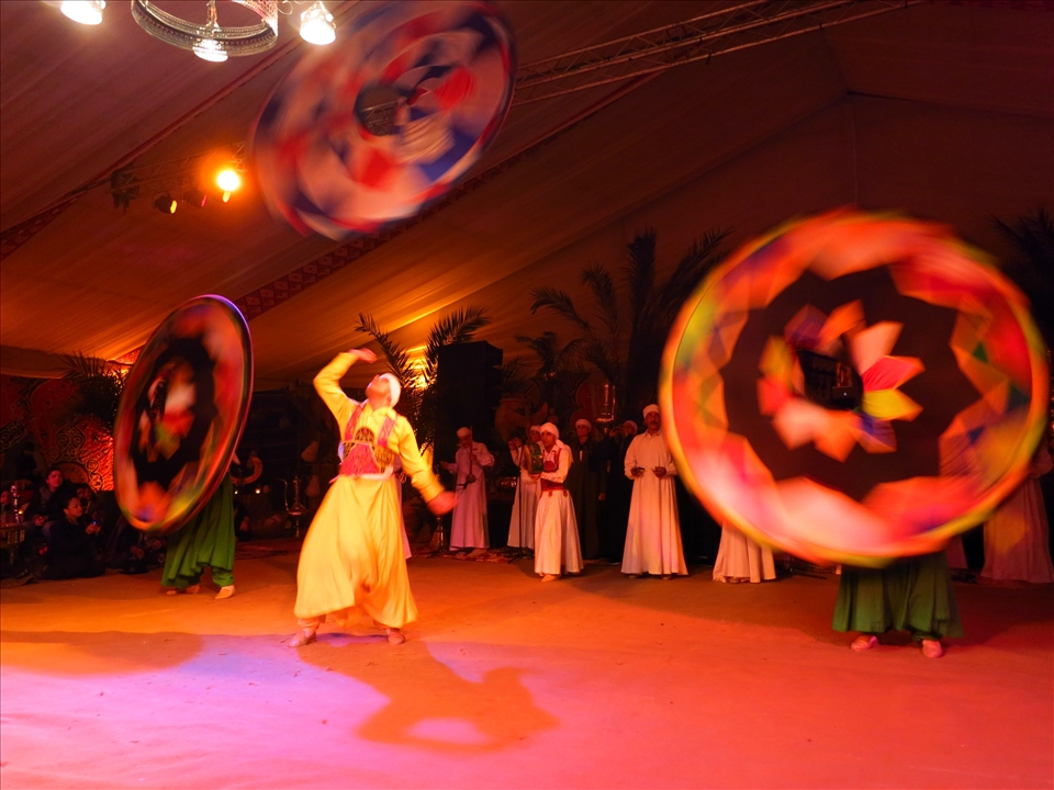 The climax of the Sufi's dance is when they juggle colorful dress.