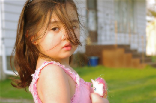 To the eyes of a child, beauty is everywhere.  An afternoon delight of fun and camaraderie, this child has enjoyed the beauty of play at the backyard.
