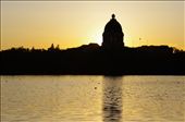 The sun sets, creating a warm mood amidst the cool breeze of the lazy afternoon.  The grandeur of the legislative building casts its shadow.: by dylan_ejem, Views[945]