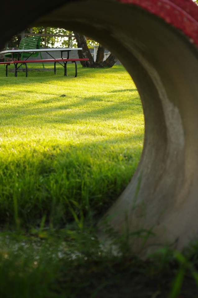 Light at the end of the tunnel.  There is hope and light beyond boundaries.  One's perception varies from another.  What is perceived as limiting has it's end at the end of a tunnel, bringing maximum possibilities.