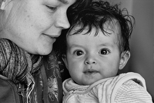 The people:  Half Italian, half Dutch baby Vera and her mother in Sora, outside of Rome where I volunteered on a farm stay (March, 2011, taken with B&W film on my Pentax K1000). 
