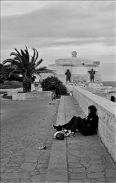 The life:  A waterfront space in Syacusa, Sicily with loitering youth, bicyclists and graffiti (April, 2011, taken with B&W film on my Pentax K1000).: by e_torretto, Views[675]
