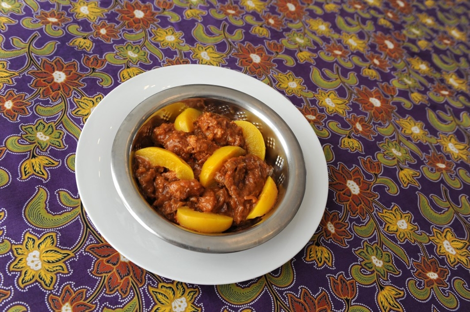 It's made with peanut butter, sambal, and peaches.